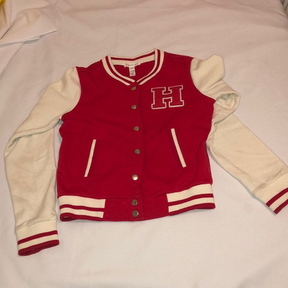 Red and white letterman jacket.